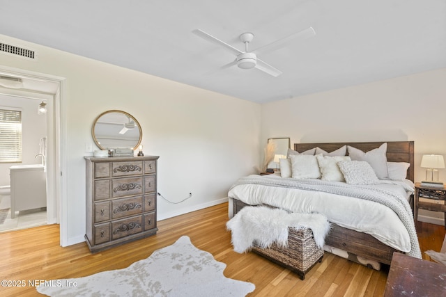 bedroom with wood-type flooring and ceiling fan