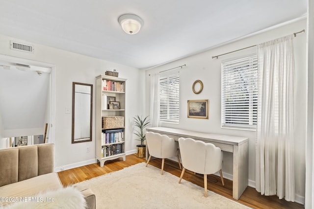 home office featuring hardwood / wood-style flooring