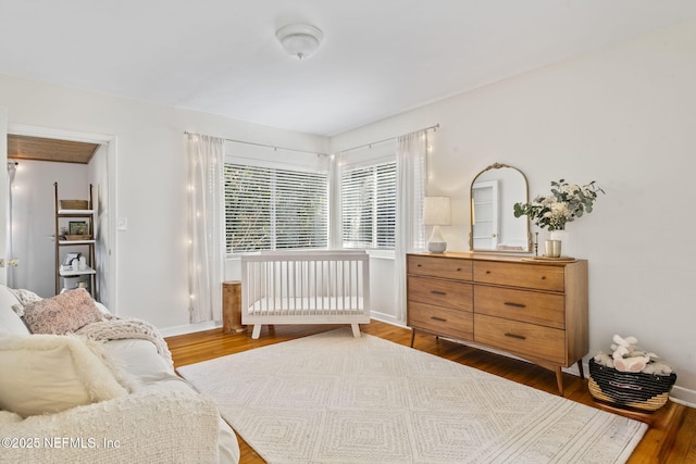 bedroom featuring dark hardwood / wood-style flooring