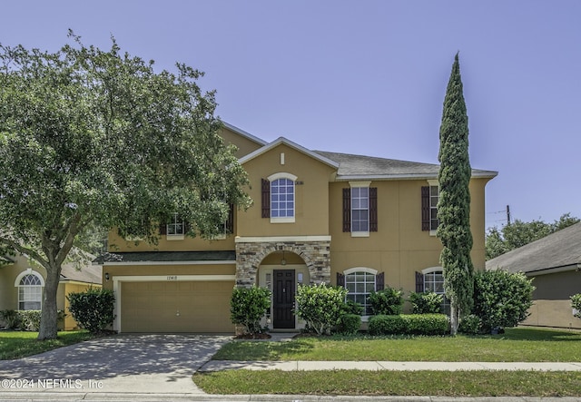 view of front of property featuring a garage