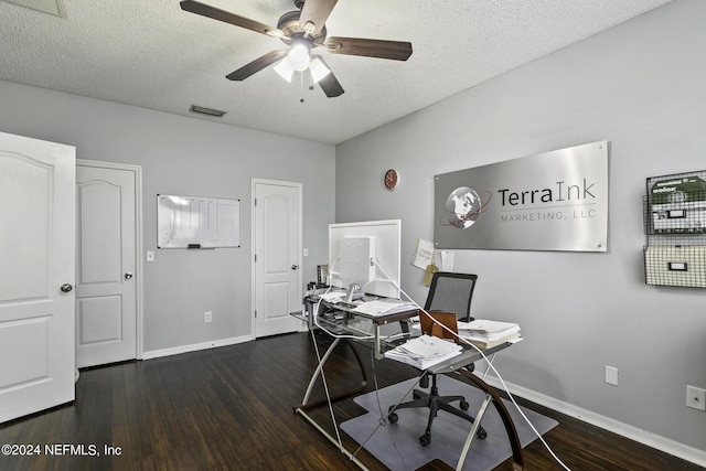 office space featuring ceiling fan, dark hardwood / wood-style floors, and a textured ceiling