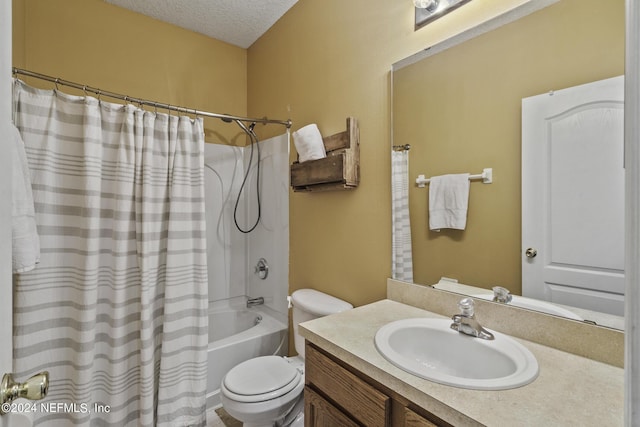 full bathroom with vanity, toilet, a textured ceiling, and shower / bath combo with shower curtain