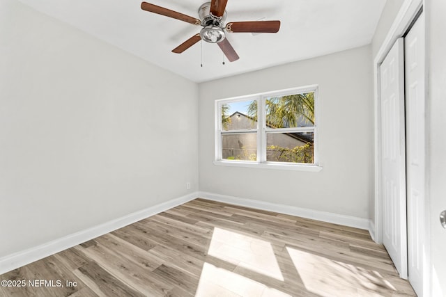 unfurnished bedroom featuring a closet, ceiling fan, and light hardwood / wood-style floors