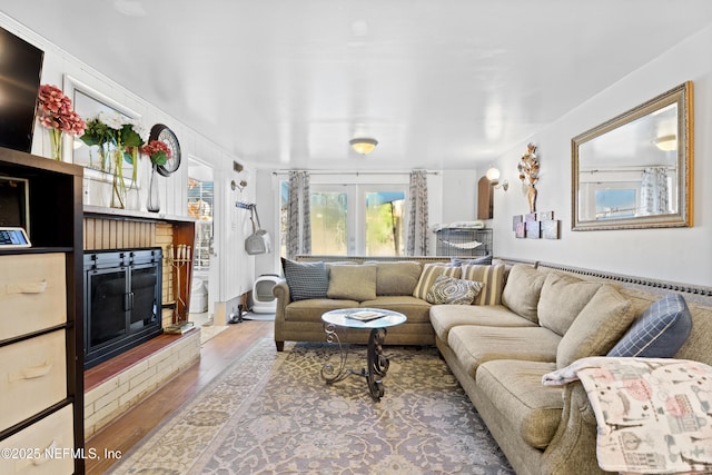 living room with hardwood / wood-style flooring and french doors