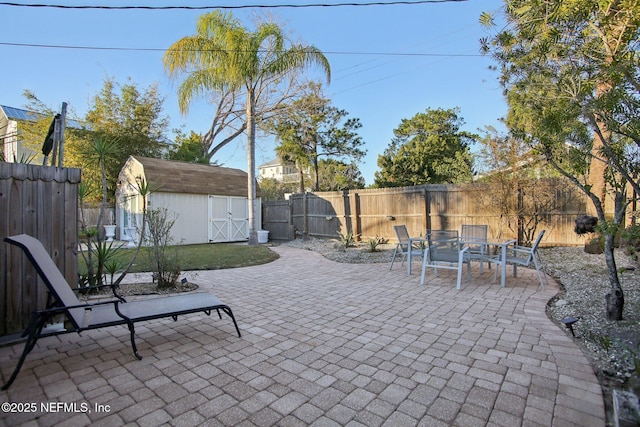 view of patio / terrace featuring a shed