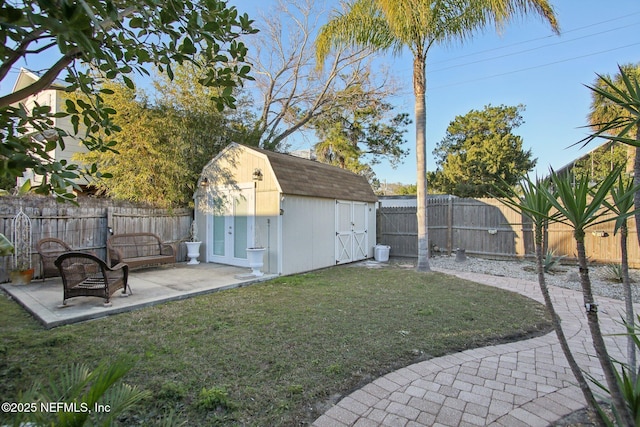 view of yard with a patio area and a shed