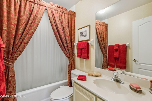 full bathroom featuring shower / tub combo, vanity, and toilet