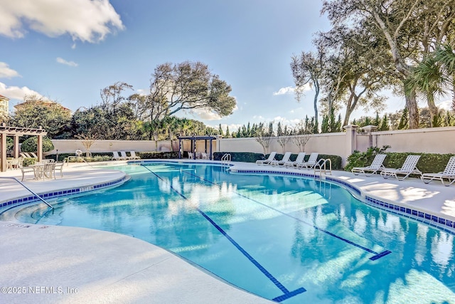 view of pool featuring a patio area