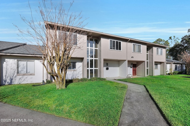 view of front of property with a front lawn