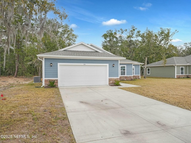 ranch-style house with a front lawn and a garage