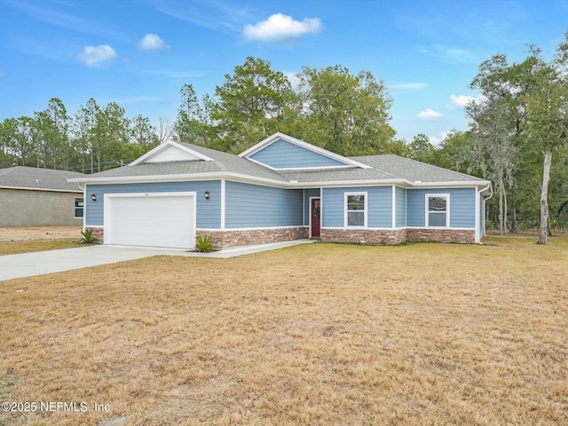 ranch-style home featuring a garage and a front yard