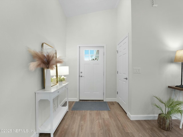 entryway featuring hardwood / wood-style flooring