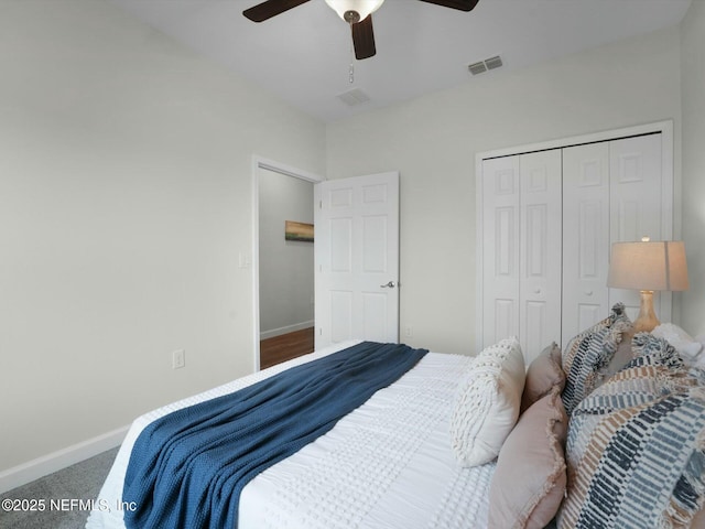 bedroom featuring ceiling fan, a closet, and carpet flooring