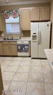 kitchen with light brown cabinetry, dishwashing machine, white refrigerator with ice dispenser, and ornamental molding