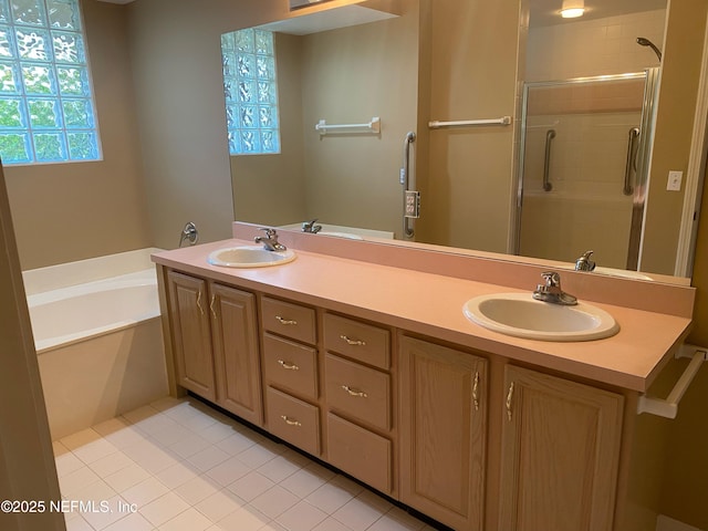 bathroom featuring vanity, separate shower and tub, and tile patterned flooring