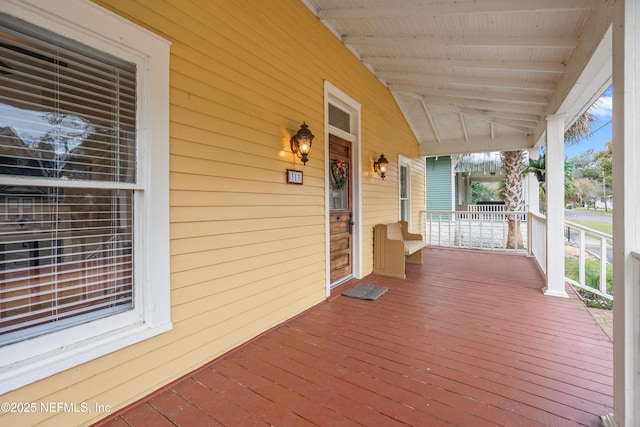 wooden deck featuring a porch