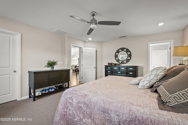 bedroom featuring ceiling fan and carpet flooring