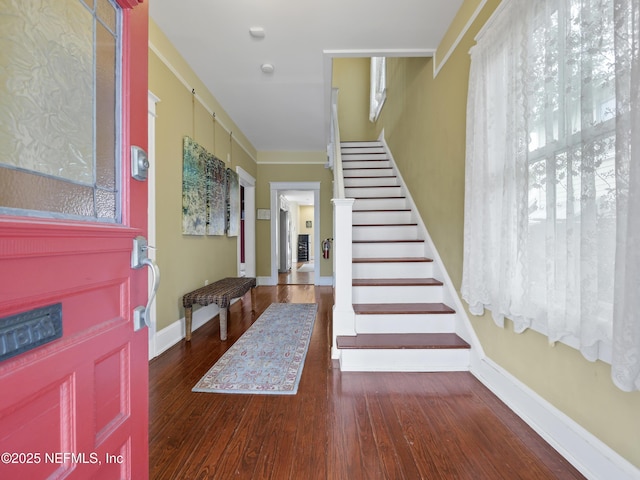 entrance foyer with dark wood-type flooring