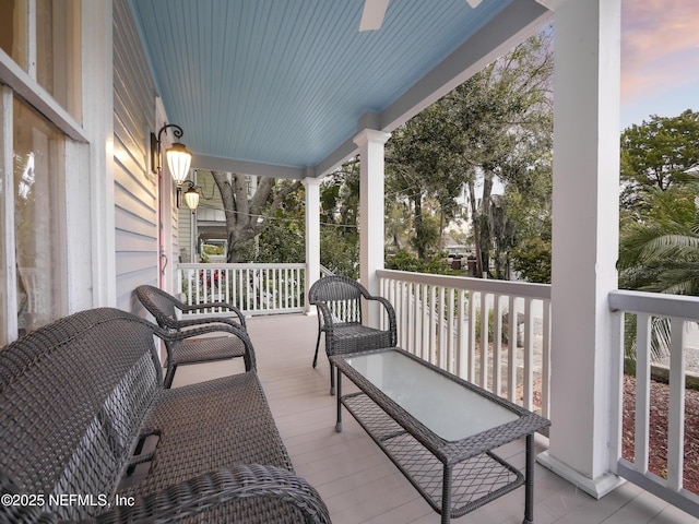 patio terrace at dusk with covered porch