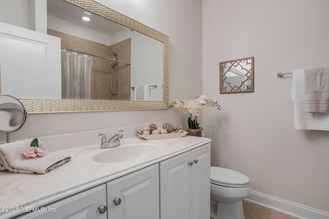 bathroom with vanity, a shower with curtain, tile patterned floors, and toilet