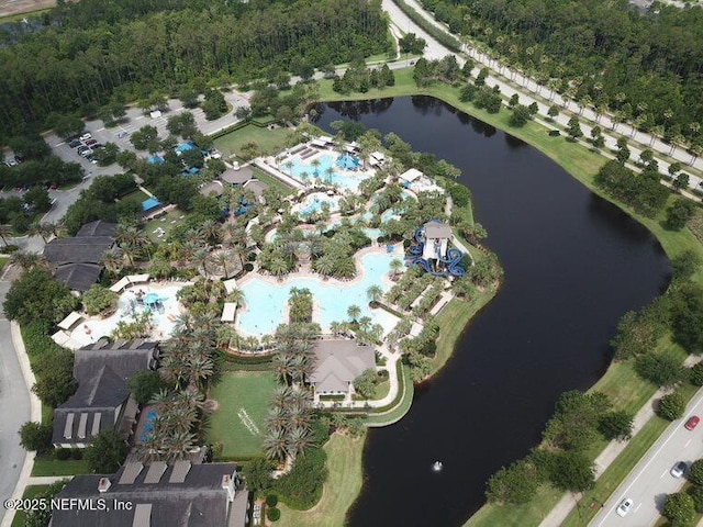 birds eye view of property with a water view