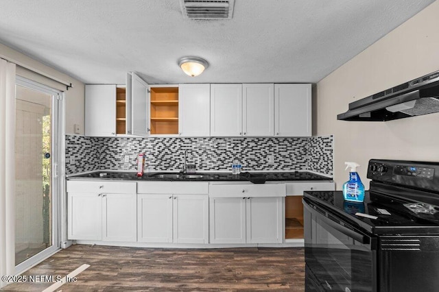 kitchen featuring white cabinets, black range with electric cooktop, decorative backsplash, sink, and dark hardwood / wood-style floors