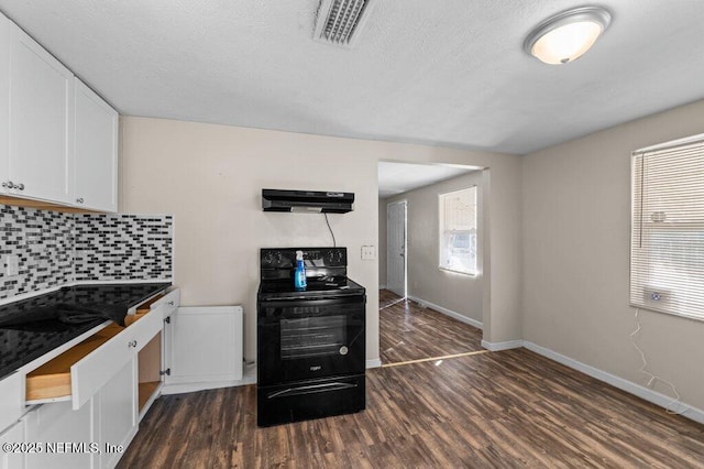 kitchen featuring white cabinets, dark hardwood / wood-style floors, tasteful backsplash, and black range with electric cooktop