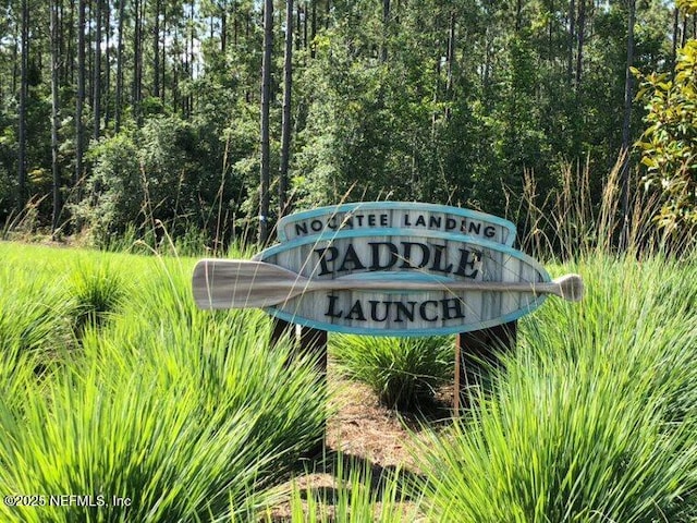 view of community sign