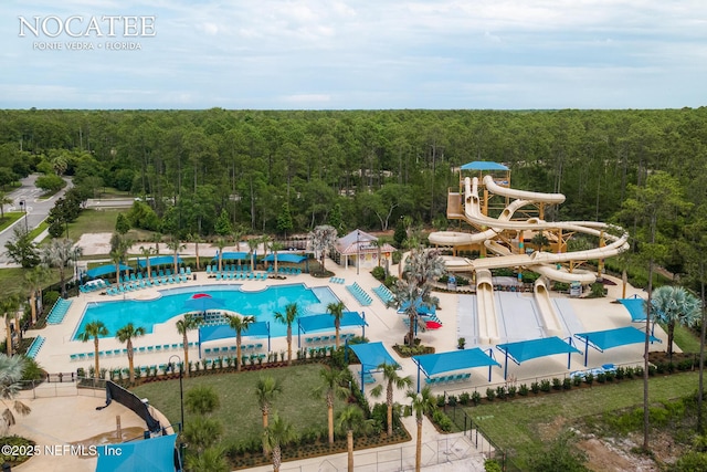 view of pool with a water slide