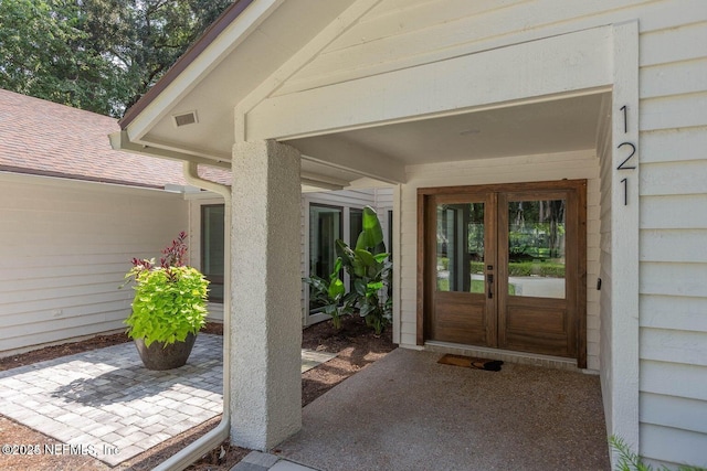 doorway to property with french doors