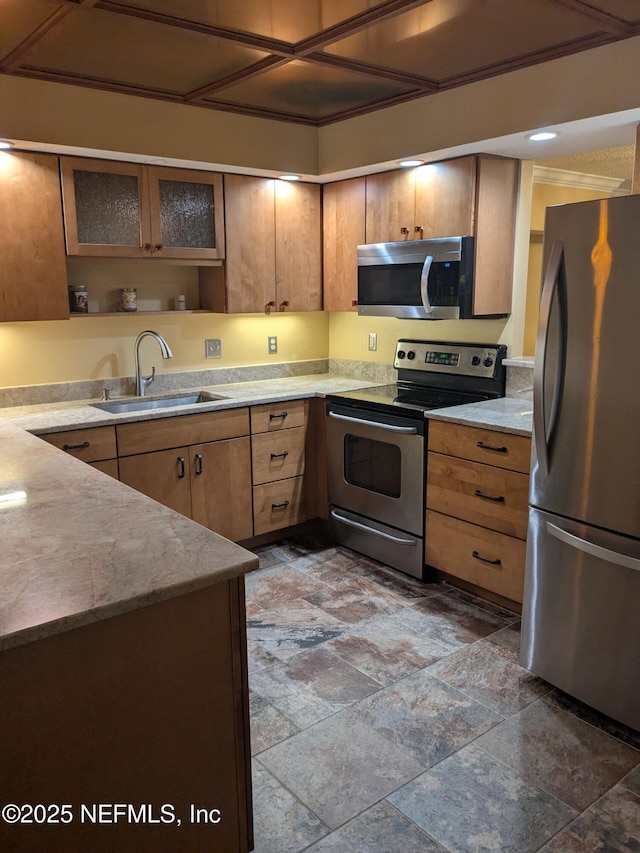 kitchen featuring appliances with stainless steel finishes and sink