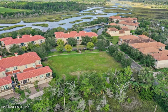 bird's eye view with a water view