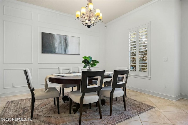 dining area with crown molding, light tile patterned floors, and an inviting chandelier