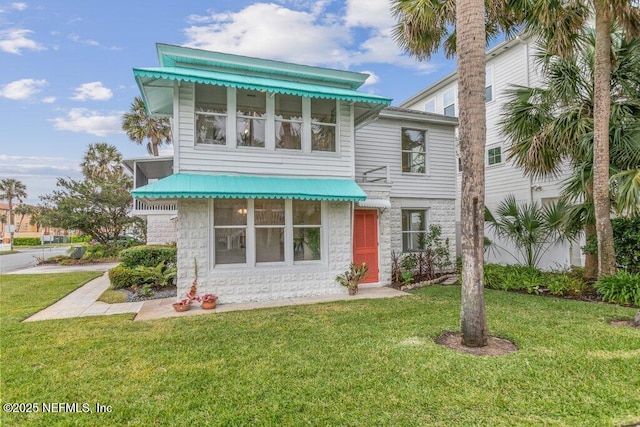 view of front of house with a front yard