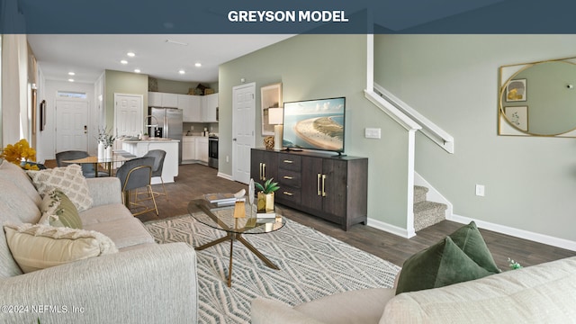 living room with dark hardwood / wood-style floors