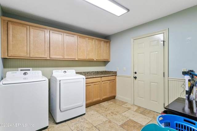 laundry room featuring cabinets and independent washer and dryer