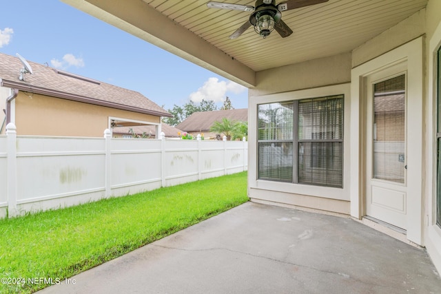 view of patio featuring ceiling fan