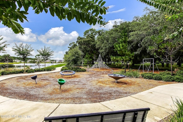 view of community with a water view