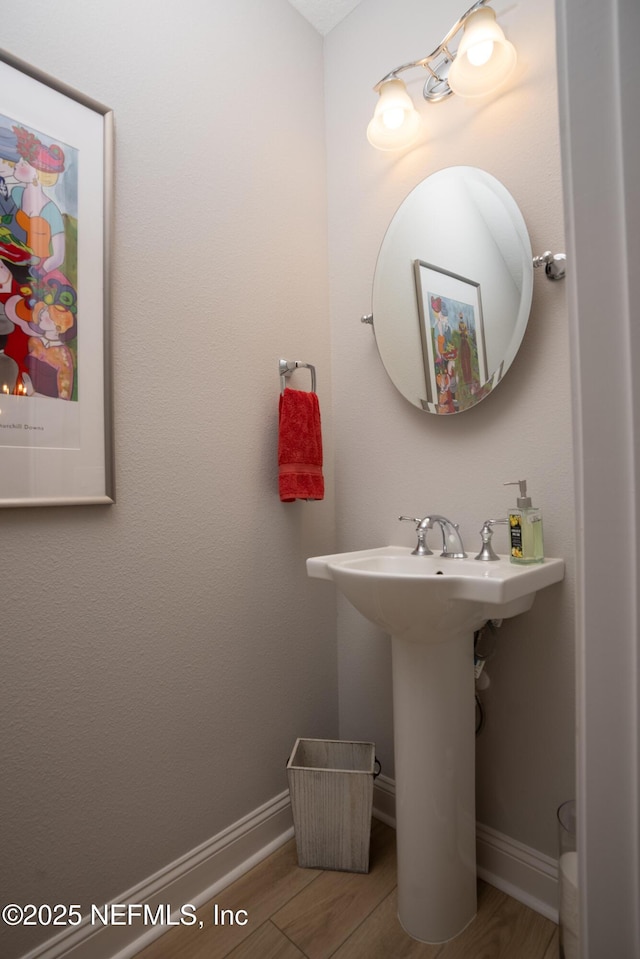 bathroom featuring hardwood / wood-style flooring