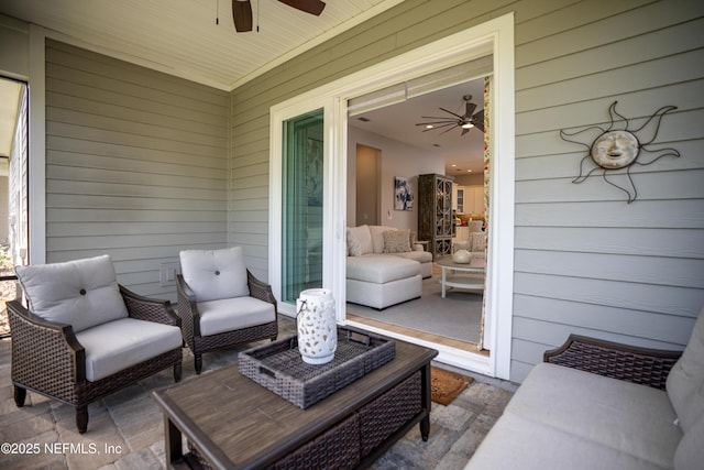 view of patio / terrace featuring ceiling fan