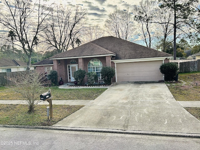 single story home with a garage