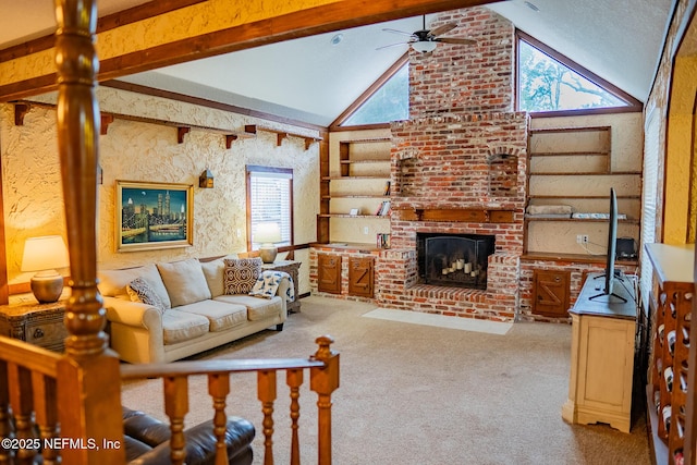 carpeted living room with a brick fireplace, lofted ceiling with beams, and ceiling fan