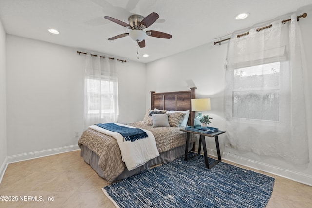 tiled bedroom with ceiling fan