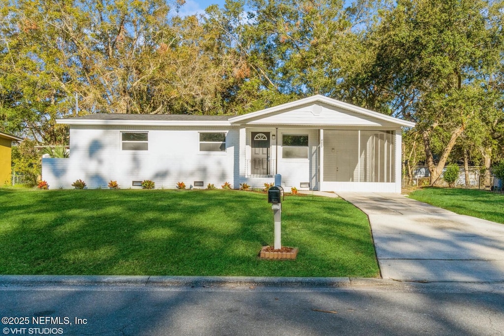 view of front of home with a front yard