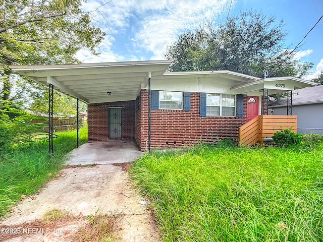 view of front of home featuring a carport