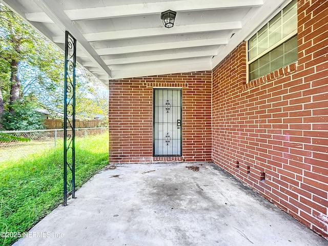 doorway to property featuring a patio