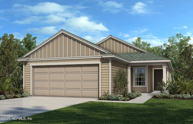 view of front of home featuring a front yard and a garage