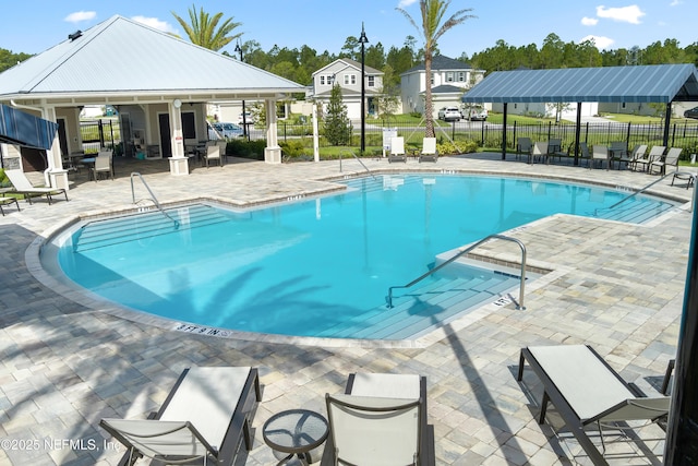 view of swimming pool with a patio area