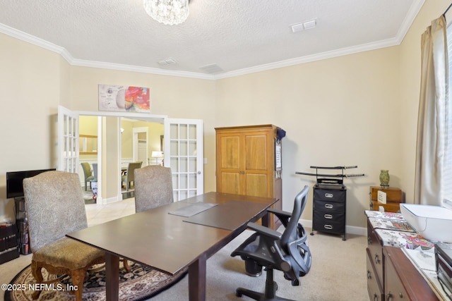 office with ornamental molding, light carpet, a textured ceiling, and french doors