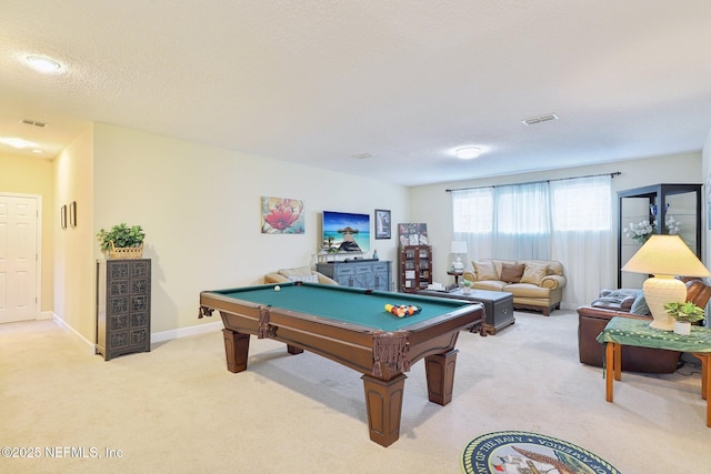 playroom featuring pool table, carpet flooring, and a textured ceiling